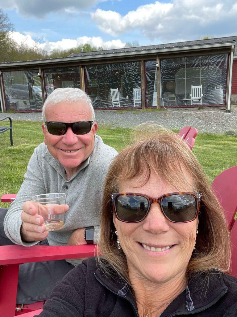 picture of kevin and michele at batton hollow winery enjoying a glass of wine