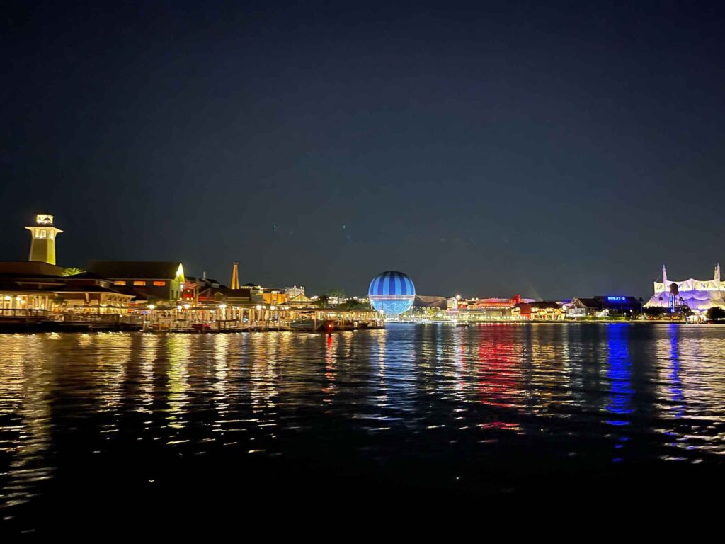 Disney Springs at night from the water view