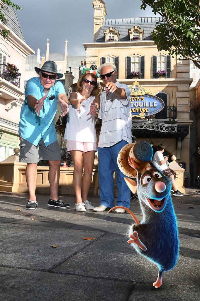 the three of us pointing to ratatouille in france at Epcot