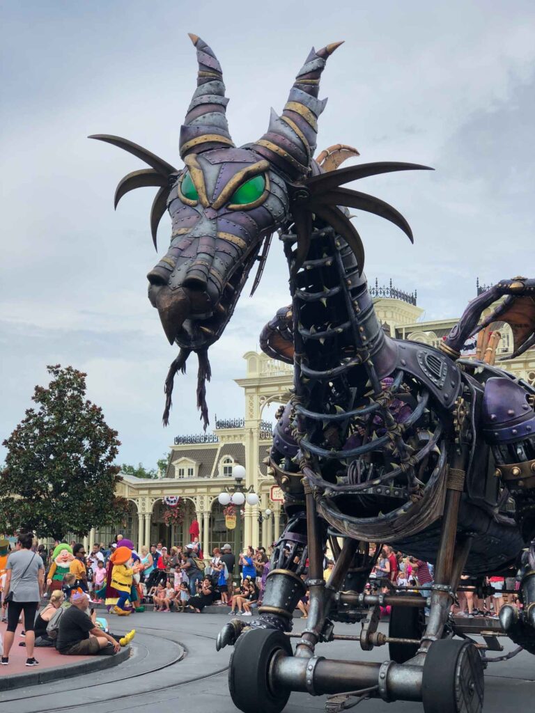 the dragon at the magic kingdom parade