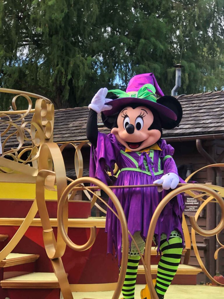 Minnie Mouse dressed up for Halloween in the parade