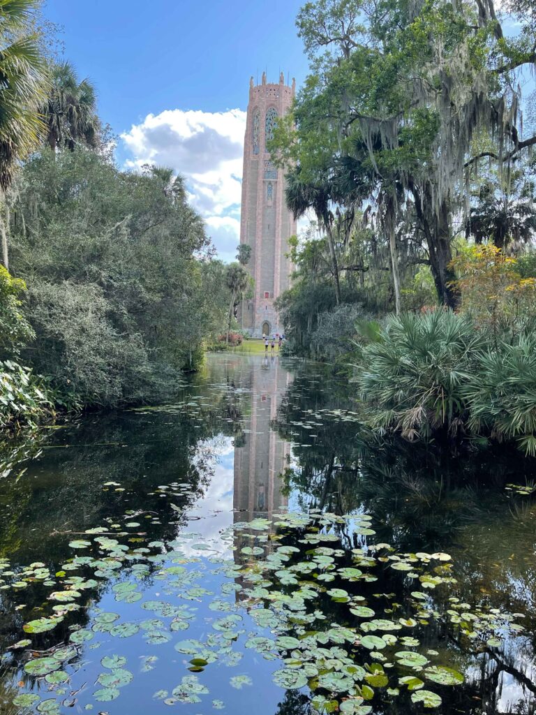 bok tower reflected in water