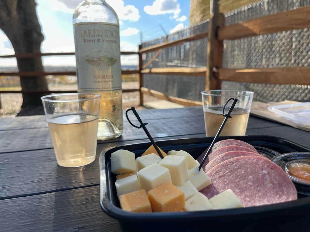 Lakeridge Winery wine on table with charcuterie board